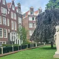 Discovering Amsterdam from the Middle Ages to the 1960s: A historical walking tour through the city that invented the Modern World